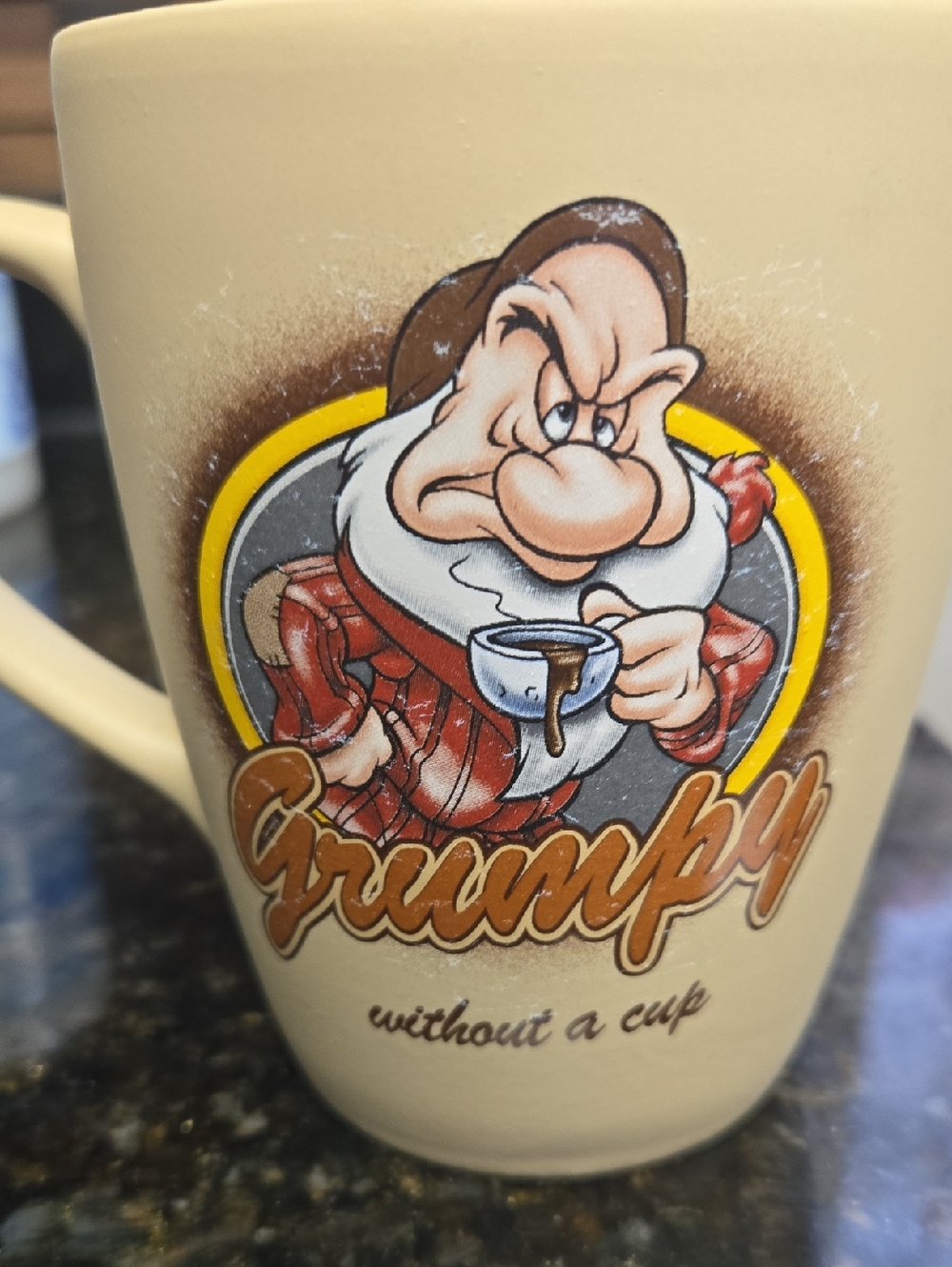Walt Disney World Beige Grumpy Character Mug with Yellow Accent